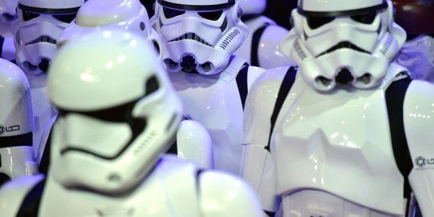 Storm troopers attend the European Premiere of 'Star Wars: The Force Awakens' in central London on December 16, 2015. Ever since 1977, when 'Star Wars' introduced the world to The Force, Jedi knights, Darth Vader, Wookiees and clever droids R2-D2 and C3PO, the sci-fi saga has built a devoted global fan base that spans the generations. AFP PHOTO / LEON NEAL / AFP / LEON NEAL (Photo credit should read LEON NEAL/AFP/Getty Images)