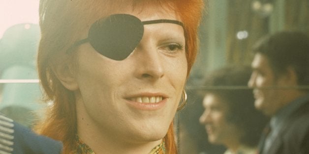 A portrait of David Bowie being interviewed wearing an eye patch at the Amstel Hotel on 7th February 1974 in Amsterdam, Netherlands. (Photo by Gijsbert Hanekroot/Redferns)