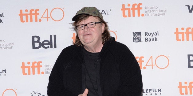 Director Michael Moore attends the "Where to Invade Next" premiere on day 1 of the Toronto International Film Festival at The Princess of Wales Theatre on Thursday, Sept. 10, 2015, in Toronto. (Photo by Evan Agostini/Invision/AP)