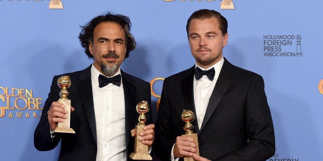 Alejandro Gonzalez Inarritu, left, and Leonardo DiCaprio pose in the press room with the award for best motion picture - dram