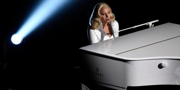 Lady Gaga performs at the Oscars on Sunday, Feb. 28, 2016, at the Dolby Theatre in Los Angeles. (Photo by Chris Pizzello/Invi