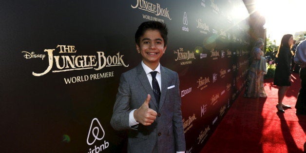Cast member Neel Sethi poses at the premiere of "The Jungle Book" at El Capitan theatre in Hollywood, California April 4, 201