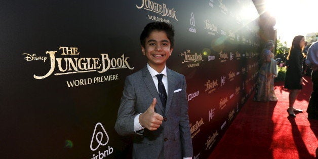 Cast member Neel Sethi poses at the premiere of "The Jungle Book" at El Capitan theatre in Hollywood, California April 4, 2016. REUTERS/Mario Anzuoni