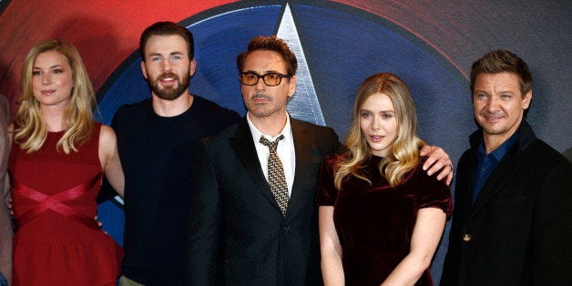 Actors (L-R) Emily VanCamp, Chris Evans, Robert Downey Jr, Elizabeth Olsen and Jeremy Renner, pose for photographers at a med