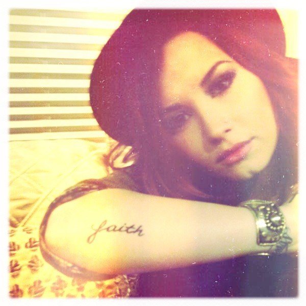 Demi Lovatos tattoos  their meanings  MamasLatinascom
