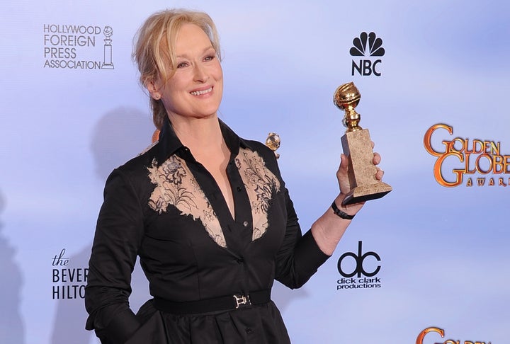 The winner for Best Performance by an Actress in a Motion Picture Drama Meryl Streep poses with the trophy at the 69th annual Golden Globe Awards at the Beverly Hilton Hotel in Beverly Hills, California, January 15, 2012. AFP PHOTO / Robyn BECK (Photo credit should read ROBYN BECK/AFP/Getty Images)