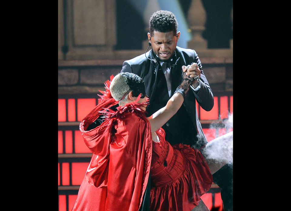 Usher with dancer, 2012 Billboard Music Awards