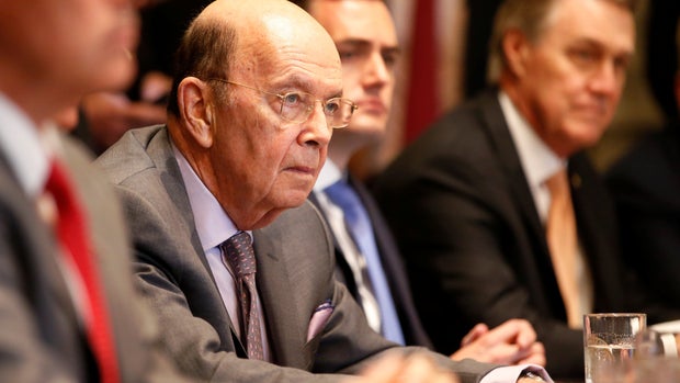 U.S. Secretary of Commerce Wilbur Ross listens as U.S. President Donald Trump speaks during a meeting in the Cabinet Room about immigration at the White House in Washington, D.C., U.S., June 20, 2018. REUTERS/Leah Millis