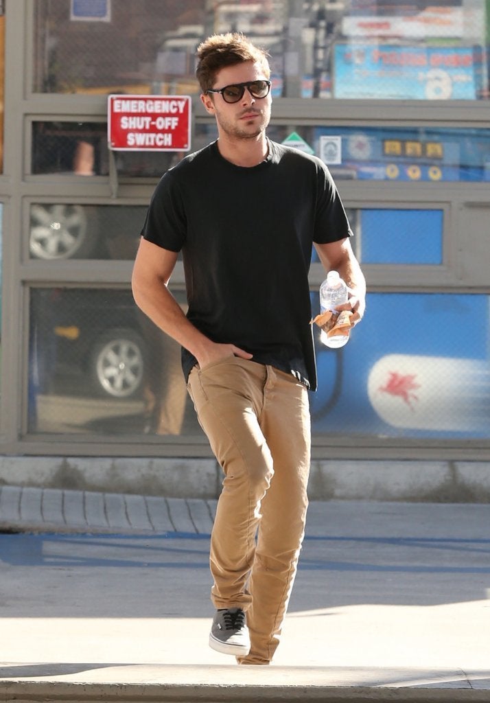 Zac Efron is ripped in tightest pants ever as he covers his