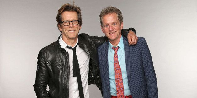 NASHVILLE, TN - JUNE 05: (L-R) Kevin Bacon and Michael Bacon of the Bacon Brothers pose at the Wonderwall portrait studio during the 2013 CMT Music Awards at Bridgestone Arena on June 5, 2013 in Nashville, Tennessee. (Photo by Christopher Polk/Getty Images for Wonderwall)