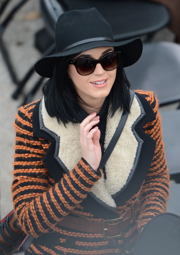 Singers Katy Perry arrives to be seated for the 57th Presidential Inauguration on January 21, 2013 at the US Capitol in Washington, DC. US President Barack Obama wil be sworn-in by Supreme Court ChG.ief Justice John G. Roberts Jr., for a second term. AFP PHOTO/ Stan HONDA (Photo credit should read STAN HONDA/AFP/Getty Images)
