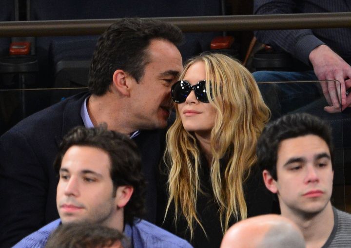 NEW YORK, NY - FEBRUARY 04: Olivier Sarkozy and Mary-Kate Olsen attend the Detroit Pistons vs New York Knicks game at Madison Square Garden on February 4, 2013 in New York City. (Photo by James Devaney/WireImage)