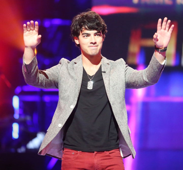 LOS ANGELES, CA - OCTOBER 04: Recording artist Joe Jonas speaks during CW's 'The Next' Taping at The Orpheum Theatre on October 4, 2012 in Los Angeles, California. (Photo by Frederick M. Brown/Getty Images)