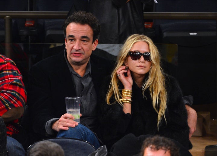 NEW YORK, NY - DECEMBER 15: Olivier Sarkozy and Mary-Kate Olsen attend the Cleveland Cavaliers vs New York Knicks game at Madison Square Garden on December 15, 2012 in New York City. (Photo by James Devaney/WireImage)