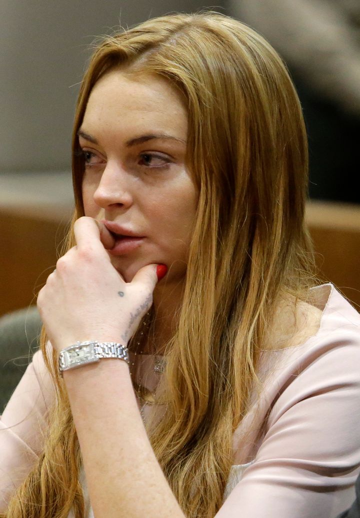 LOS ANGELES, CA - MARCH 18: Actress Lindsay Lohan appear at a hearing in Los Angeles Superior Court on March 18, 2013 in Los Angeles, California. The hearing is to determine whether Lohan returns to jail or averts a trial on charges that she lied to police over a June, 2012 car crash that briefly sent her to the hospital. Lohan has pleaded not guilty to three misdemeanor charges filed after the accident - reckless driving, lying to police and obstructing officers from performing their duties. (Photo by Reed Saxon - Pool/WireImage)