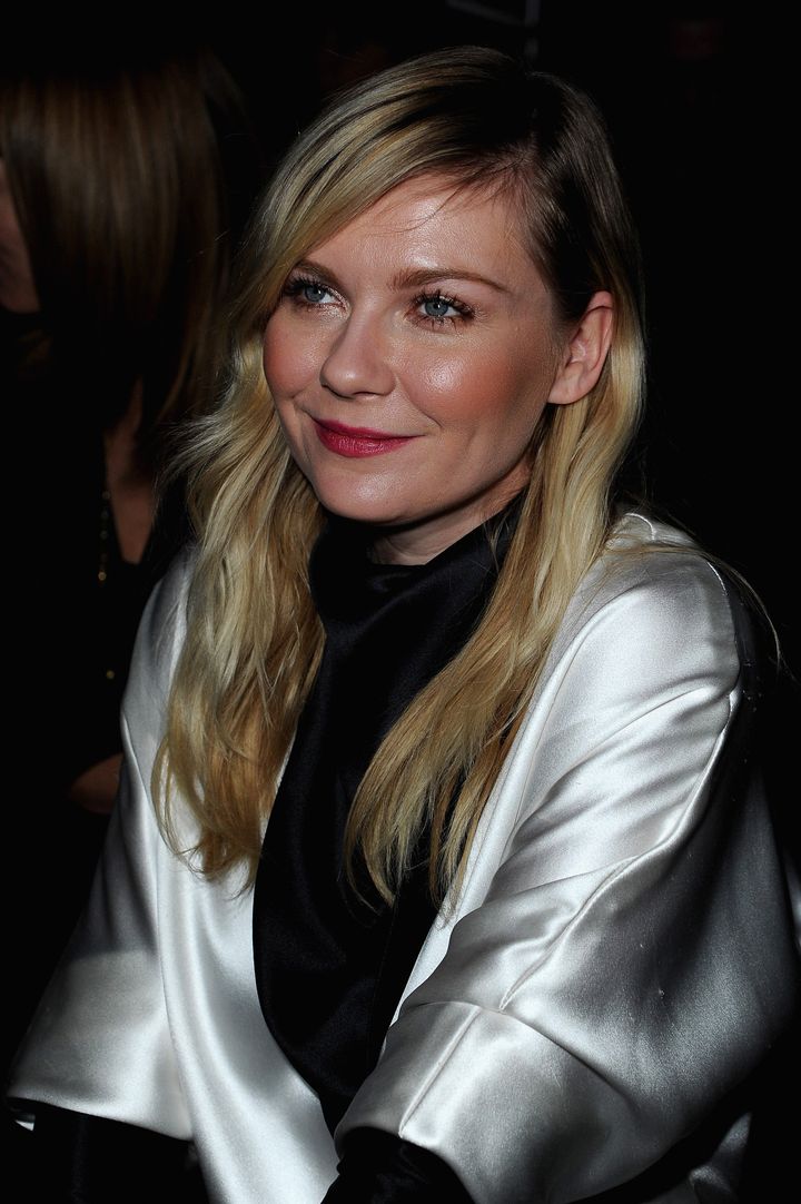 PARIS, FRANCE - MARCH 04: Kirsten Dunst attends the Saint Laurent Fall/Winter 2013 Ready-to-Wear show as part of Paris Fashion Week on March 4, 2013 in Paris, France. (Photo by Pascal Le Segretain/Getty Images)