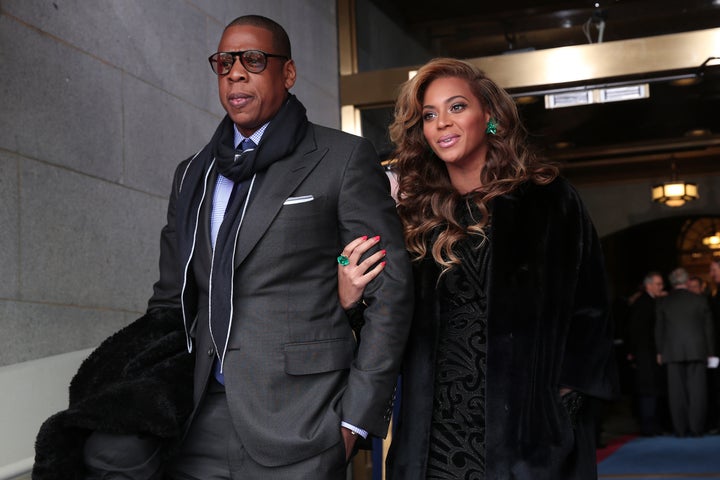 Recording artists Jay-Z and Beyonce arrive at the presidential inauguration on the West Front of the US Capitol January 21, 2