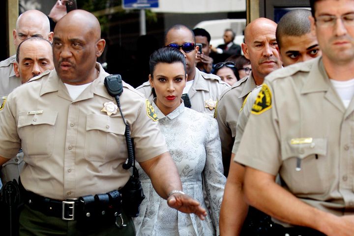 LOS ANGELES, CA - APRIL 12: Kim Kardashian surrounded by Los Angeles County Sheriff Deputies leaves the Stanley Mosk Courthouse after attending her divorce hearing from Kris Humphries on April 12, 2013 in Los Angeles, California. Kim Kardashian and NBA player Kris Humphries are appearing for divorce proceedings. Humphries is seeking an annulment of their ten-week marriage, claiming it was based on fraud. (Photo by David McNew/Getty Images)