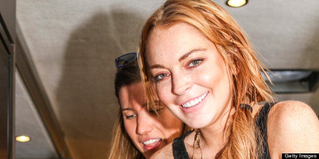 UNSPECIFIED LOCATION - APRIL 14: In this handout photo provided by Kari Feinstein PR, Lindsay Lohan holding Elecrtic Picks,