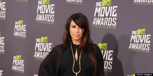 CULVER CITY, CA - APRIL 14: TV Personality Kim Kardashian arrives at the 2013 MTV Movie Awards at Sony Pictures Studios on April 14, 2013 in Culver City, California. (Photo by Jeffrey Mayer/WireImage)