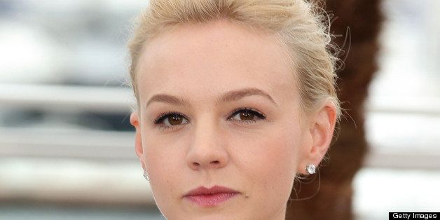 CANNES, FRANCE - MAY 15: Carey Mulligan attends the photocall for 'The Great Gatsby' at The 66th Annual Cannes Film Festiva at Palais des Festivals on May 15, 2013 in Cannes, France. (Photo by Mike Marsland/WireImage)
