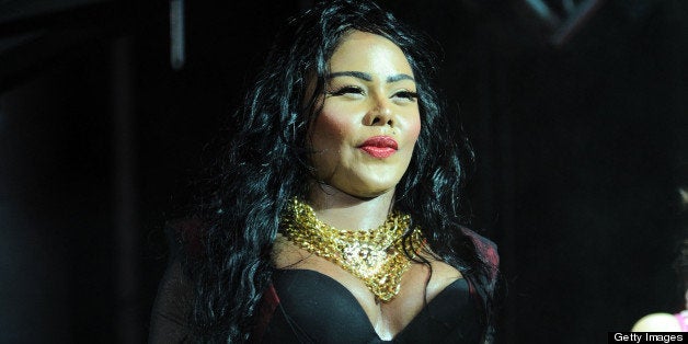 EAST RUTHERFORD, NJ - JUNE 02: Lil' Kim performs during HOT 97 Summer Jam XX at MetLife Stadium on June 2, 2013 in East Ruth