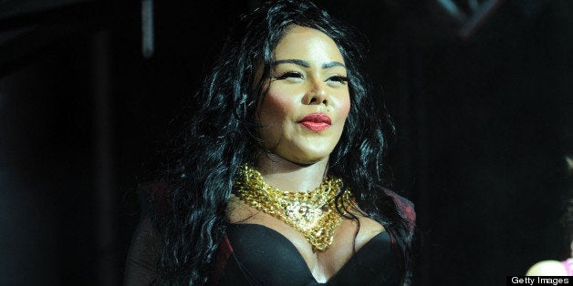 EAST RUTHERFORD, NJ - JUNE 02: Lil' Kim performs during HOT 97 Summer Jam XX at MetLife Stadium on June 2, 2013 in East Rutherford, New Jersey. (Photo by Ilya S. Savenok/Getty Images)