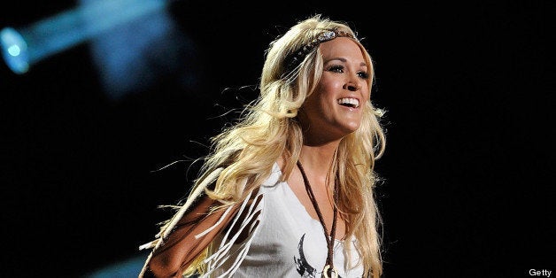 NASHVILLE, TN - JUNE 09: Carrie Underwood performs at LP Field during the 2013 CMA Music Festival on June 9, 2013 in Nashville, Tennessee. (Photo by Frederick Breedon IV/WireImage)