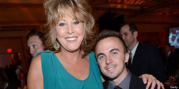 PHOENIX, AZ - MARCH 23: Basketball player Nancy Lieberman and actor Frankie Muniz attend Muhammad Ali's Celebrity Fight Night