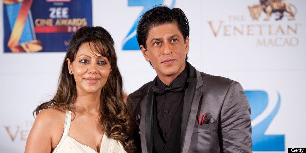 MACAU, CHINA - JANUARY 21: Indian actor Shah Rukh Khan and his wife Gauri Khan attends red carpet during the Zee Cine Awards 2012 ceremony at The Venetian Macao-Resort-Hotel on January 21, 2012 in Macau. (Photo by Victor Fraile/Getty Images)