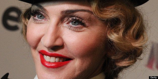 NEW YORK, NY - JUNE 18: Madonna attends the Dolce & Gabbana and The Cinema Society screening of the Epix World premiere of 'Madonna: The MDNA Tour' at The Paris Theatre on June 18, 2013 in New York City. (Photo by Jennifer Graylock/Getty Images)
