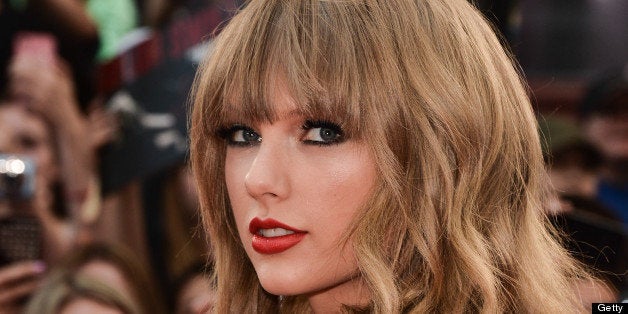 TORONTO, ON - JUNE 16: Singer Taylor Swift arrives at the 2013 MuchMusic Video Awards at MuchMusic HQ on June 16, 2013 in Toronto, Canada. (Photo by George Pimentel/WireImage)