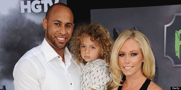 HOLLYWOOD, CA - SEPTEMBER 24: (L-R) Hank Baskett, Hank Baskett IV and Kendra Wilkinson attend the premiere of 'Frankenweenie' at the El Capitan Theatre on September 24, 2012 in Hollywood, California. (Photo by Jason LaVeris/FilmMagic)