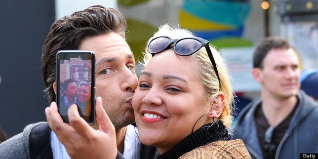 LOS ANGELES, CA - MARCH 06: Zach Braff kisses a fan at The Grove on March 6, 2013 in Los Angeles, California. (Photo by Noel Vasquez/FilmMagic)