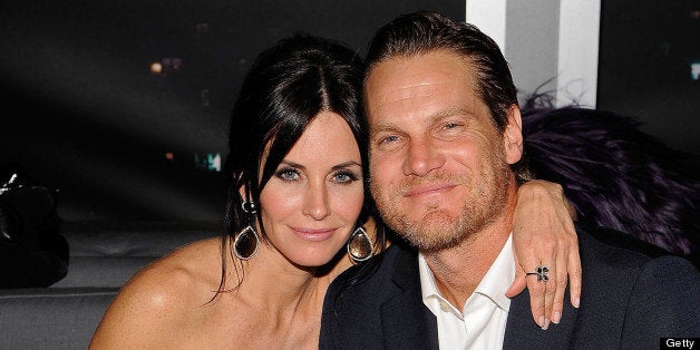 BEVERLY HILLS, CA - JANUARY 17: Actress Courteney Cox and actor Brian Van Holt attend the InStyle and Warner Bros. 67th Annu