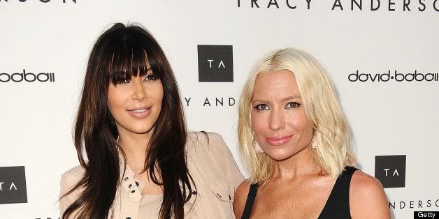 BRENTWOOD, CA - APRIL 04: Kim Kardashian and Tracy Anderson attend the opening of Tracy Anderson Flagship Studio on April 4, 2013 in Brentwood, California. (Photo by Jason LaVeris/FilmMagic)