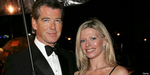 LONDON - FEBRUARY 19: Actor Pierce Brosnan and daughter Charlotte arrive at The Orange British Academy Film Awards (BAFTAs) at the Odeon Leicester Square on February 19, 2006 in London, England. (Photo by MJ Kim/BAFTA via Getty Images)