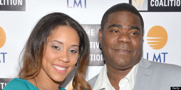WASHINGTON, DC - APRIL 26: Megan Wollover (L) and comedian Tracy Morgan attend the Celebrating The Arts In American Dinner Party With Distinguished Women In Media Presented By Landmark Technology Inc. And The Creative Coalition at Neyla on April 26, 2013 in Washington, DC. (Photo by Mike Coppola/Getty Images for Landmark Technology Inc.)