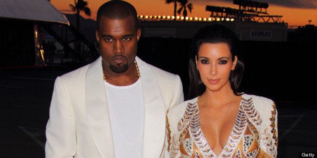 CANNES, FRANCE - MAY 23: Kanye West and Kim Kardashian attend the 'Cruel Summer' presentation during the 65th Annual Cannes Film Festival on May 23, 2012 in Cannes, France. (Photo by Mike Marsland/WireImage)