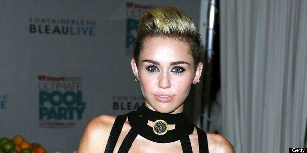 MIAMI BEACH, FL - JUNE 29: Miley Cyrus poses backstage at the iHeartRadio Ultimate Pool Party Presented by VISIT FLORIDA at Fontainebleau's BleauLive in Miami on June 29, 2013 in Miami Beach, Florida. (Photo by Larry Marano/Getty Images for Clear Channel)
