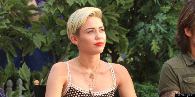 Miley Cyrus Does Fishnet Crop Top And Skirt For Good Morning America