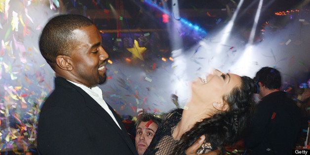 LAS VEGAS, NV - DECEMBER 31: (Exclusive Coverage) Kanye West and Kim Kardashian celebrate New Year's Eve countdown at 1 OAK Nightclub at The Mirage Hotel & Casino on December 31, 2012 in Las Vegas, Nevada. (Photo by Denise Truscello/WireImage)