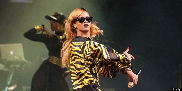 KINROSS, UNITED KINGDOM - JULY 13: Rihanna performs on stage on Day 2 of T In The Park 2013 at Balado on July 13, 2013 in Kinross, Scotland. (Photo by Ross Gilmore/Redferns via Getty Images)