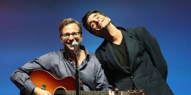 MANCHESTER, TN - JUNE 16: Bob Saget and John Stamos perform onstage at the Comedy Theatre hosted by IFC during day 4 of the 2013 Bonnaroo Music & Arts Festival on June 16, 2013 in Manchester, Tennessee. (Photo by FilmMagic/FilmMagic)