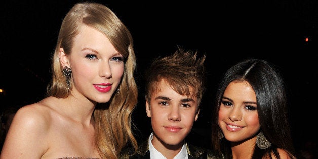 LAS VEGAS, NV - MAY 22: (L-R) Musician Taylor Swift, singer Justin Beiber and singer Selena Gomez pose during the 2011 Billb
