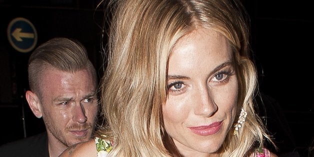 LONDON, UNITED KINGDOM - JULY 29: Sienna Miller sighting at the BMW i3 party, Old Billingsgate on July 29, 2013 in London, E