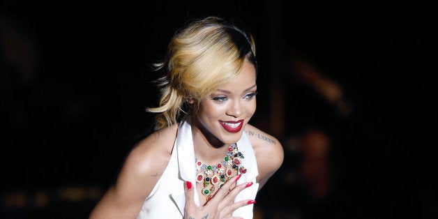 Barbadian singer Rihanna performs on stage, on July 10, 2013 in Monaco. AFP PHOTO / VALERY HACHE (Photo credit should