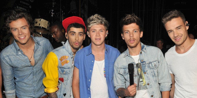 UNIVERSAL CITY, CA - AUGUST 11: (L-R) Musicians Harry Styles, Zayn Malik, Niall Horan, Louis Tomlinson, and Liam Payne of O