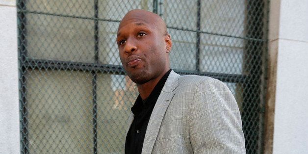 NEW YORK, NY - MARCH 05: NBA player Lamar Odom arrives to attend a custody hearing with ex-girlfriend Liza Morales at New York State Supreme Court on March 5, 2013 in New York City. Morales is the mother of Lamar's nine-year old daughter and five-year old son. (Photo by Jemal Countess/Getty Images)