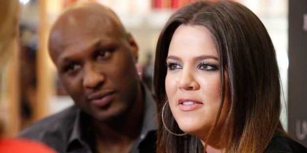 ORANGE, CA - JUNE 07: Professional basketball player Lamar Odom and TV personality Khloe Kardashian make an appearance to pr